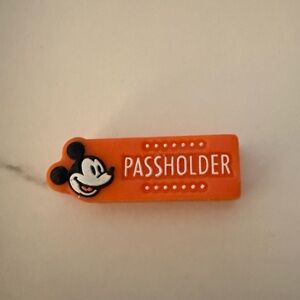 Disney Orange Passholder Magic Band slider